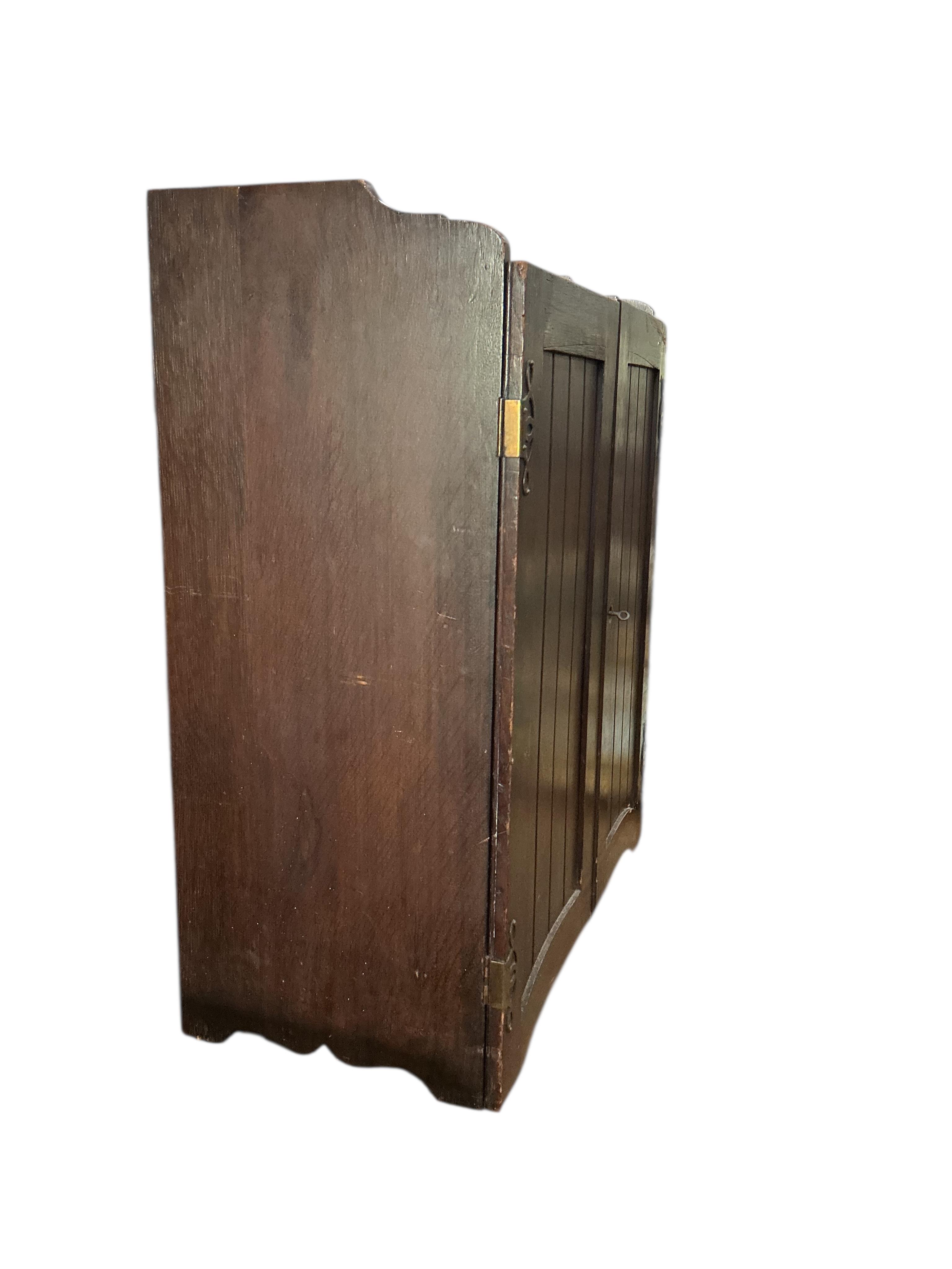 An Edwardian oak stationery cabinet, width 57cm, depth 29cm, height 72cm